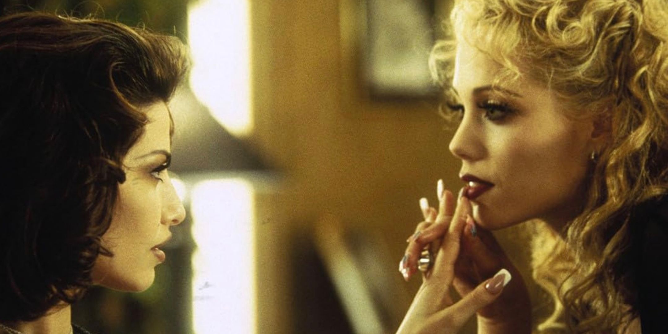 Gina Gershon and Elizabeth Berkley in Showgirls