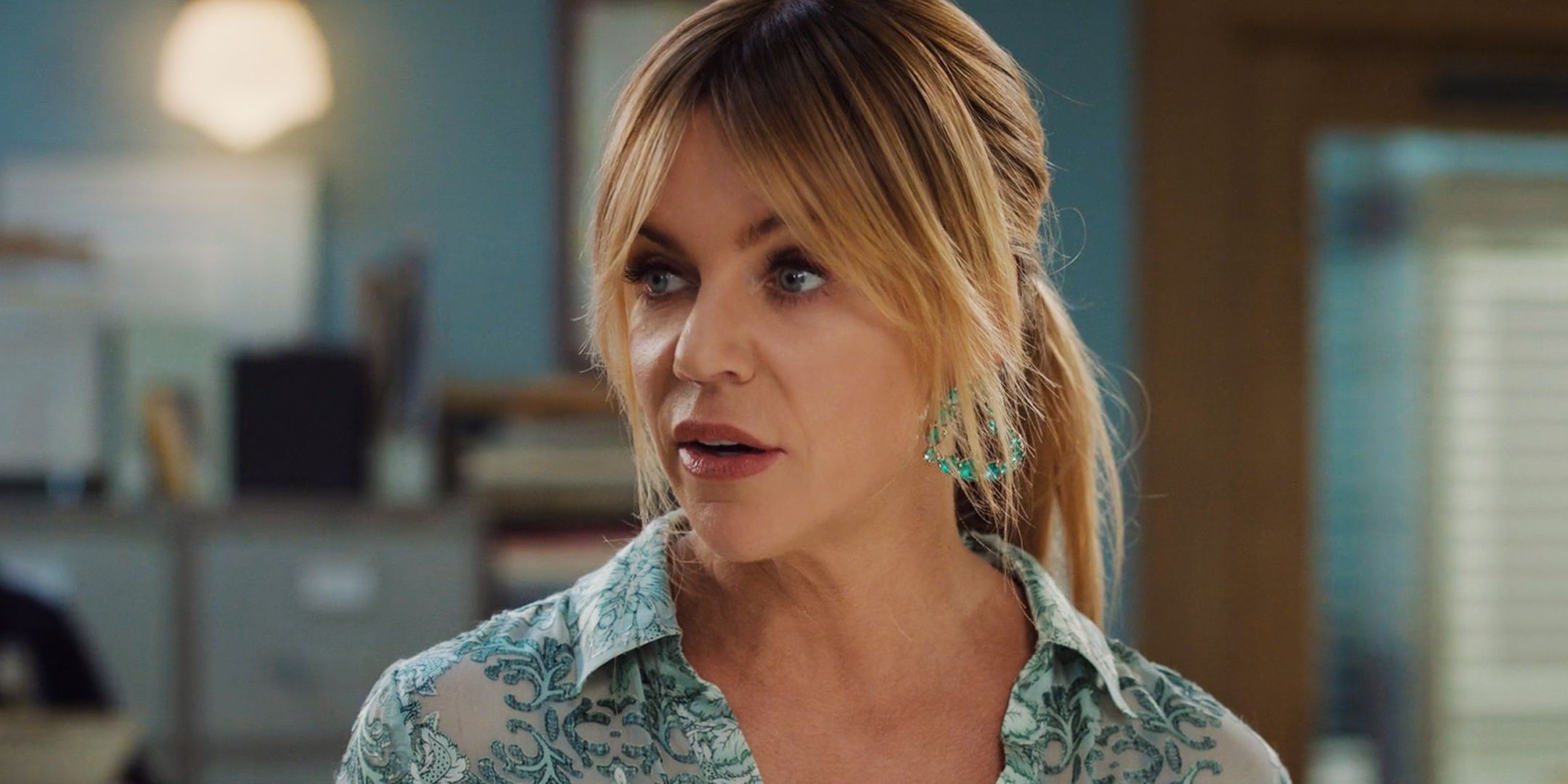 Morgan (Kaitlin Olson) looks at someone off camera in High Potential season 1