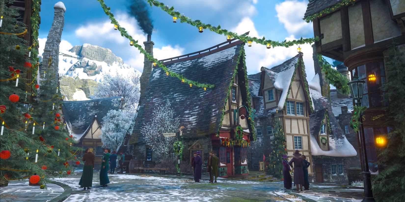 Hogsmede covered in christmas decorations in Hogwarts Legacy.