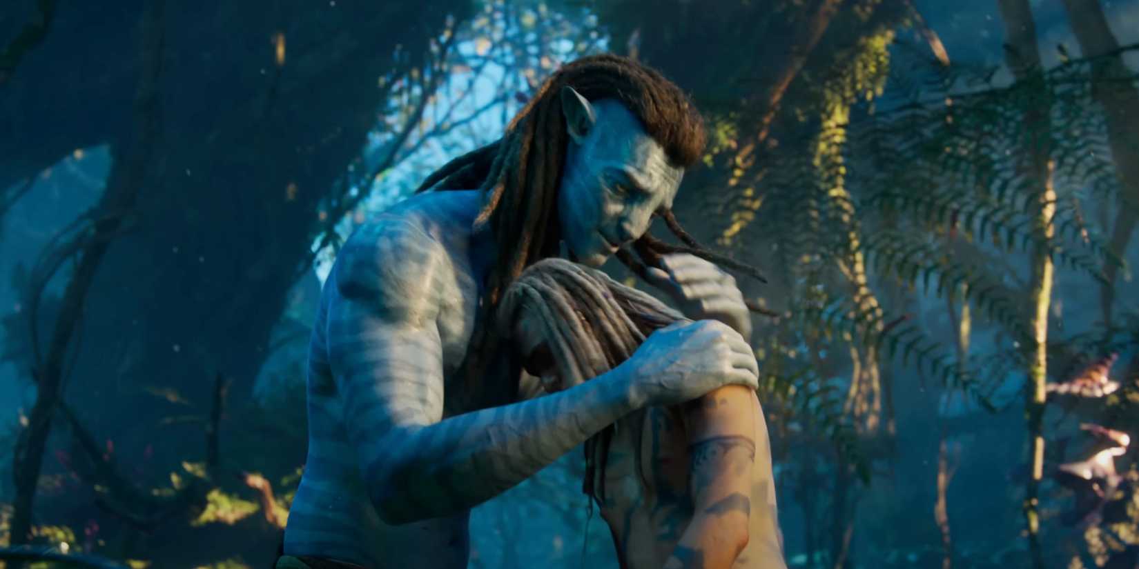 Jake Sully hugging Spider in Avatar Fire and Ash