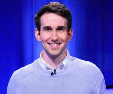 Jeopardy Champion Scott Riccardi Smiling At Podium