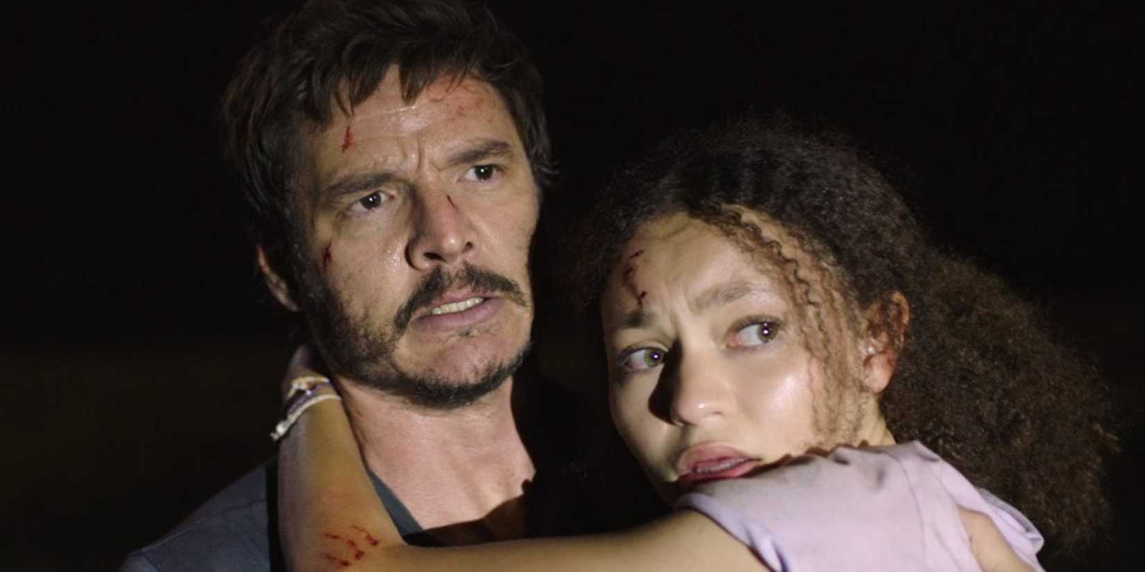 Joel carrying Sarah in The Last of Us