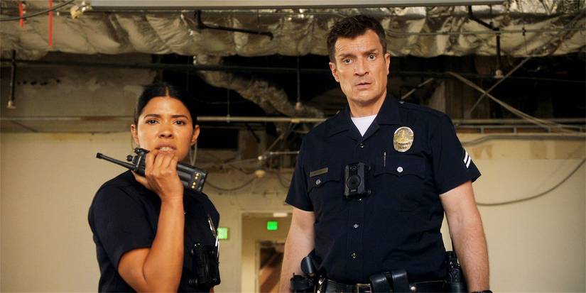John (Nathan Fillion) and Celina (Lisseth Chavez) in The Rookie season 7, standing together