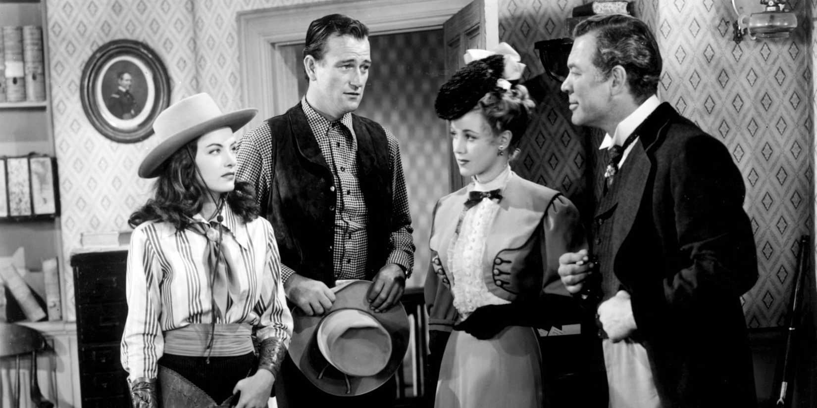 John Wayne and Ward Bond in Tall in the Saddle