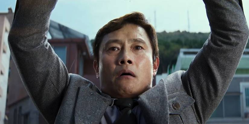 Lee Byung-hun is falling down in No Other Choice
