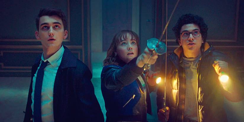 Lockwood & Co with Anthony, Lucy, and George staring up at a ghost