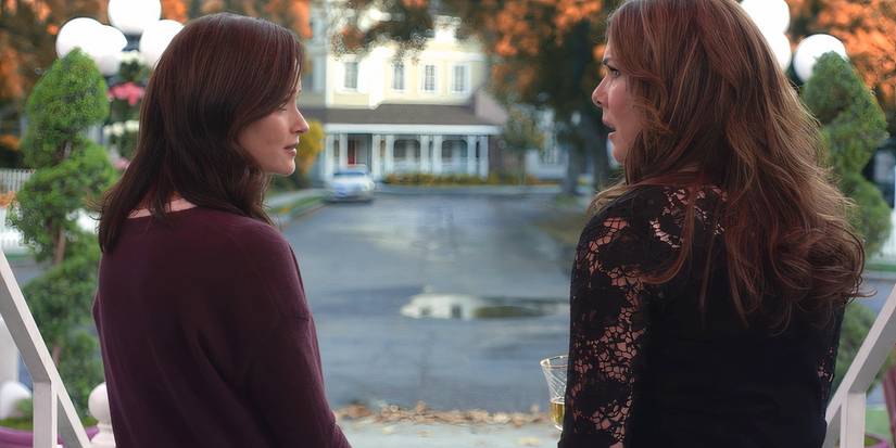 Lorelai stares at Rory, looking shocked as the sit in the gazebo in Gilmore Girls A Year in the Life