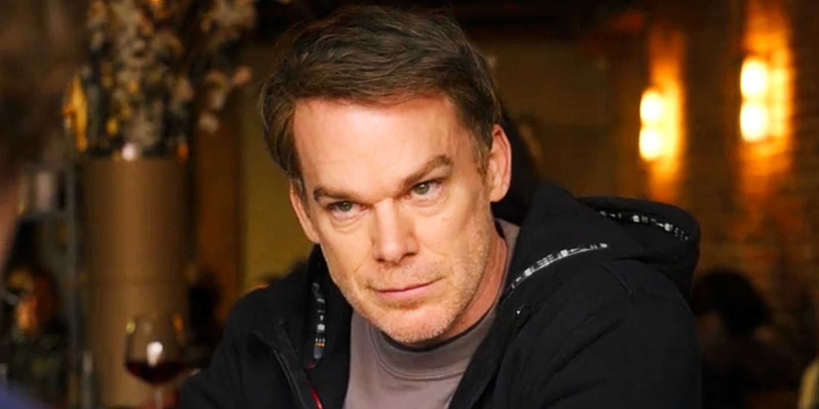 Michael C. Hall as Dexter Morgan in a restaurant looking on suspiciously in Dexter Resurrection episode 4