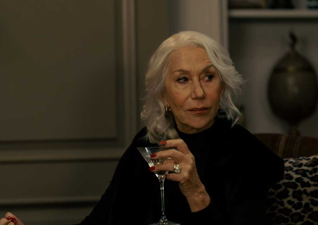 Helen Mirren holding a glass in MobLand