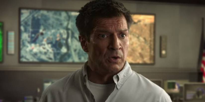 Nathan Fillion looking shocked in The Recruit