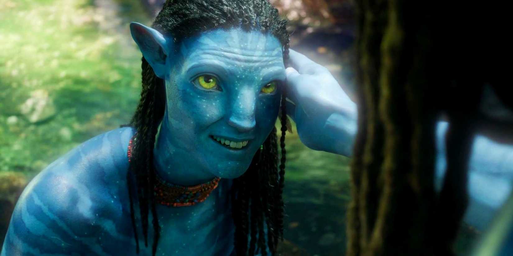 Neteyam smiling up at someone who strokes his face in Avatar the Way of Water