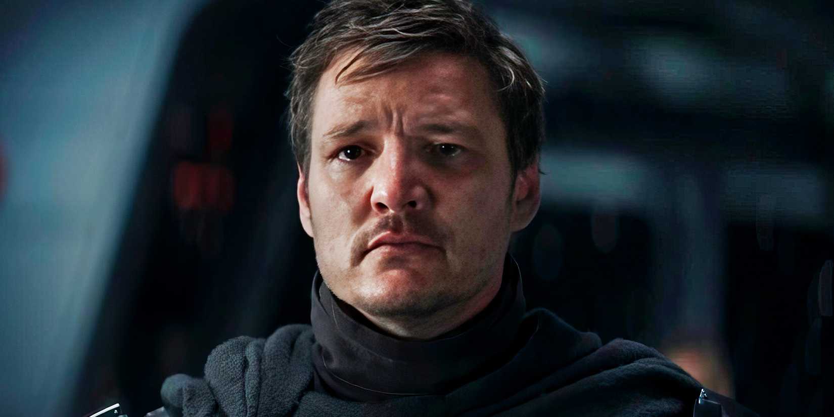 Pedro Pascal as Din Djarin with his helmet off and tears in his eyes in The Mandalorian