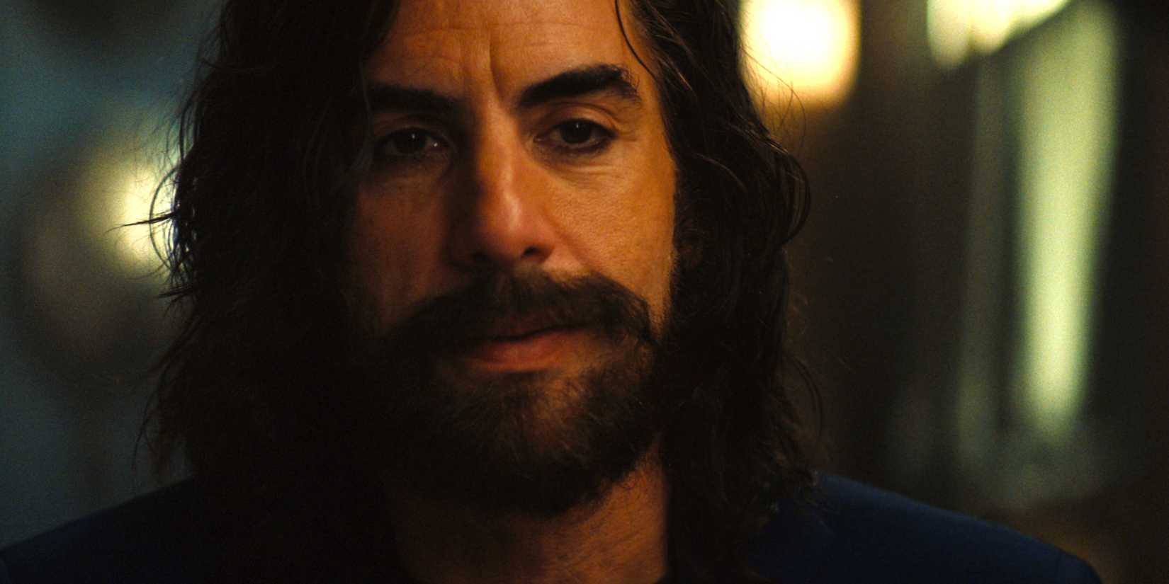 Sacha Baron Cohen's Mephisto in Ironheart looking offscreen