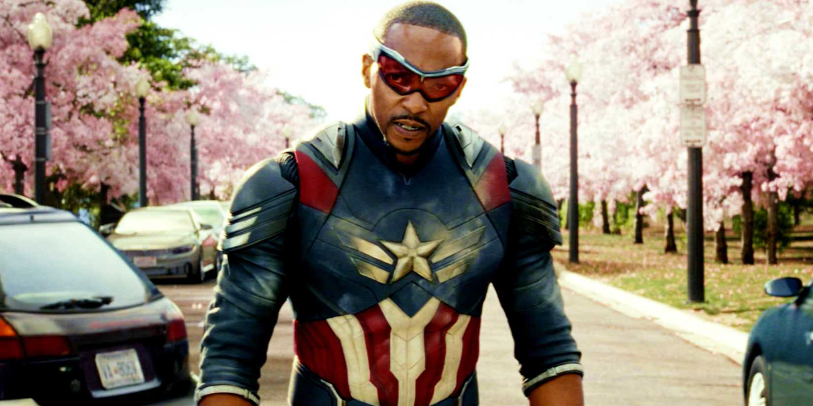 Sam Wilson looks exhausted as he stands on the road in Captain America: A Brave New World