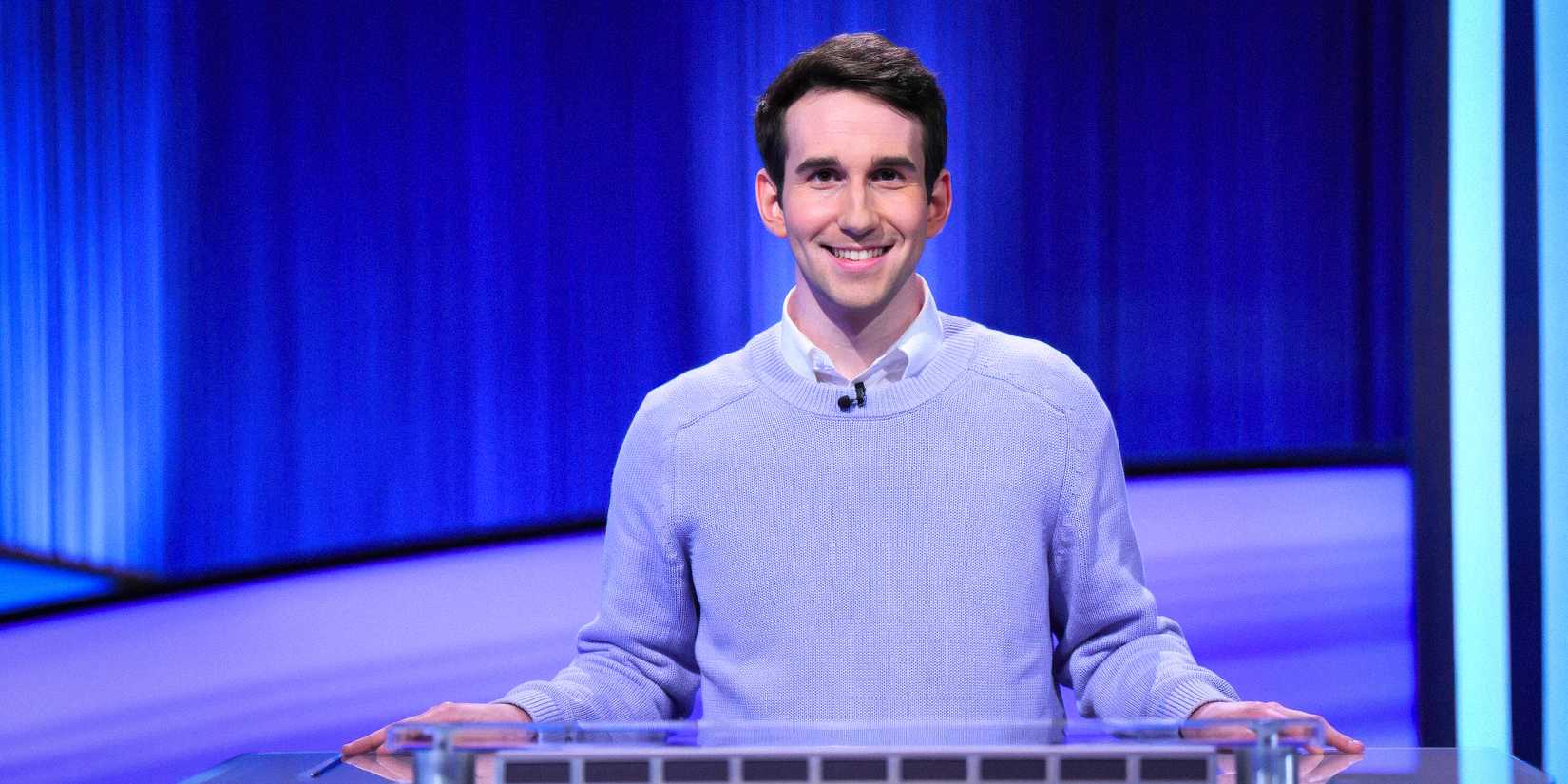 Jeopardy!'s Scott Riccardi smiles on stage