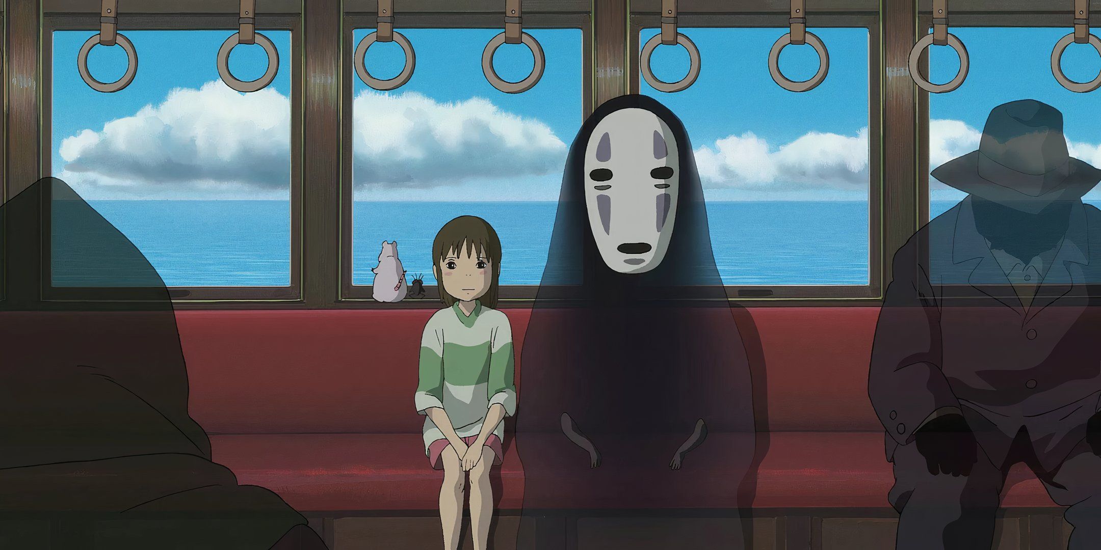 Chihiro seduta su un treno accanto a No Face in Spirited Away