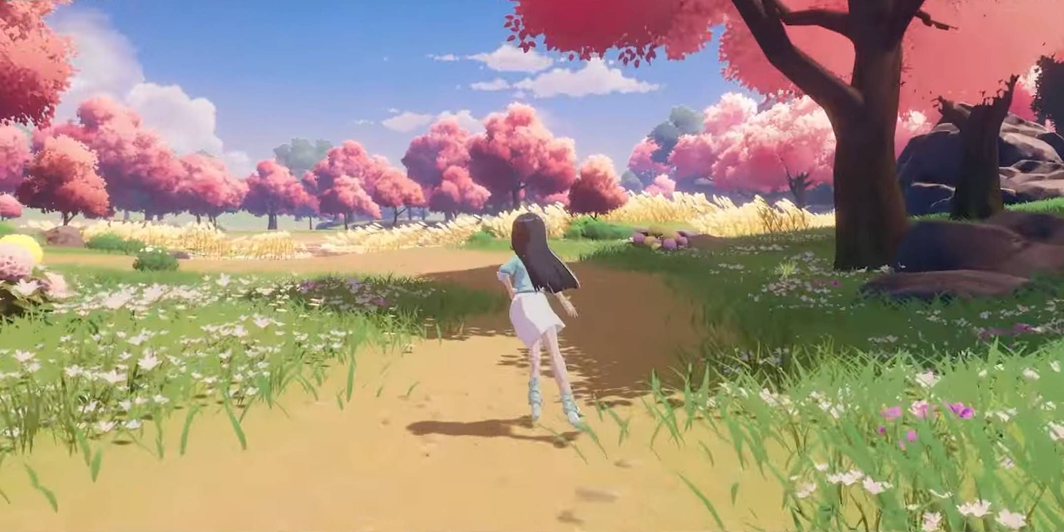 The player skating through a forest of pink trees in Starsand Island.