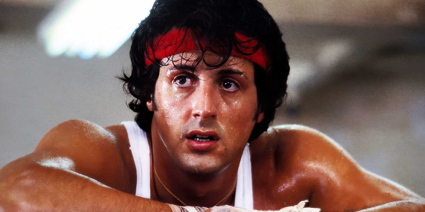 Sylvester Stallone gazes off to the side in a scene from Rocky