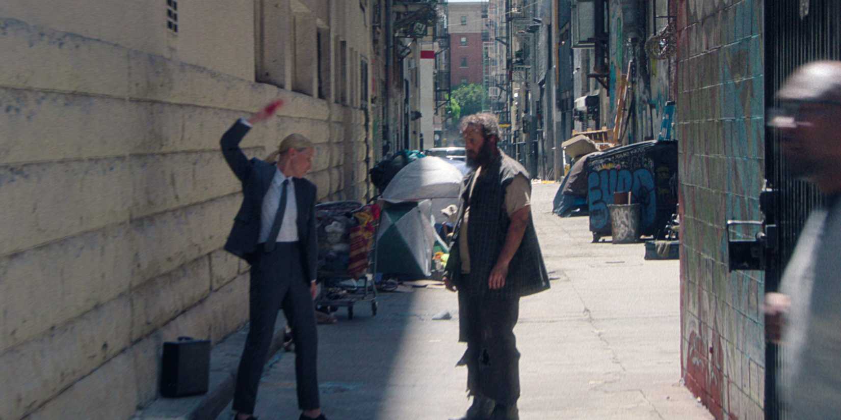 The American recruiter playing ddakji with a homeless person in Squid Game's series finale