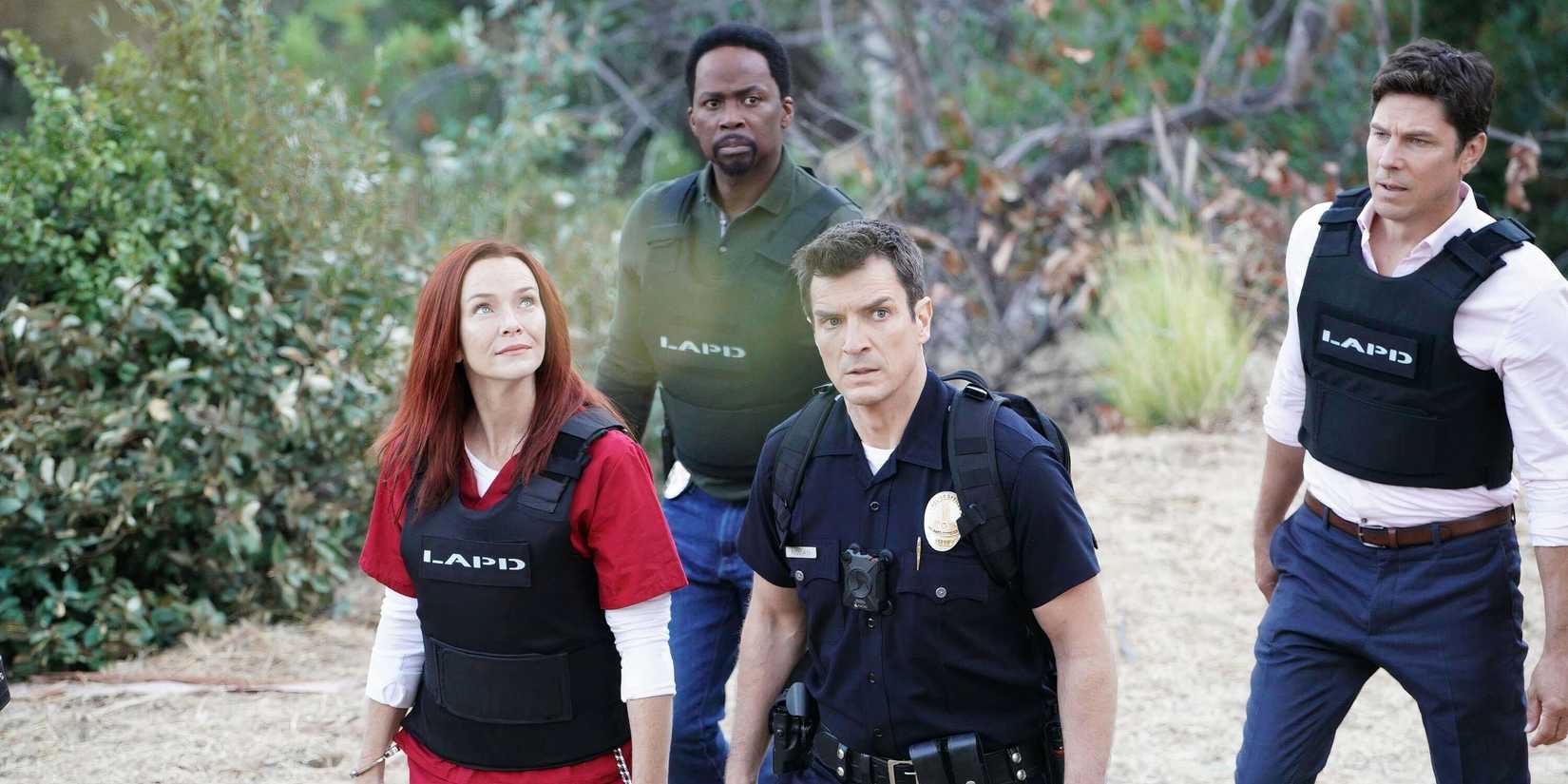 Rosalind Dyer (Annie Wesching), John Nolan (Nathan Fillion), Nick Armstrong (Harold Perrineau), and Sean Del Monte (Michael Trucco) in The Rookie