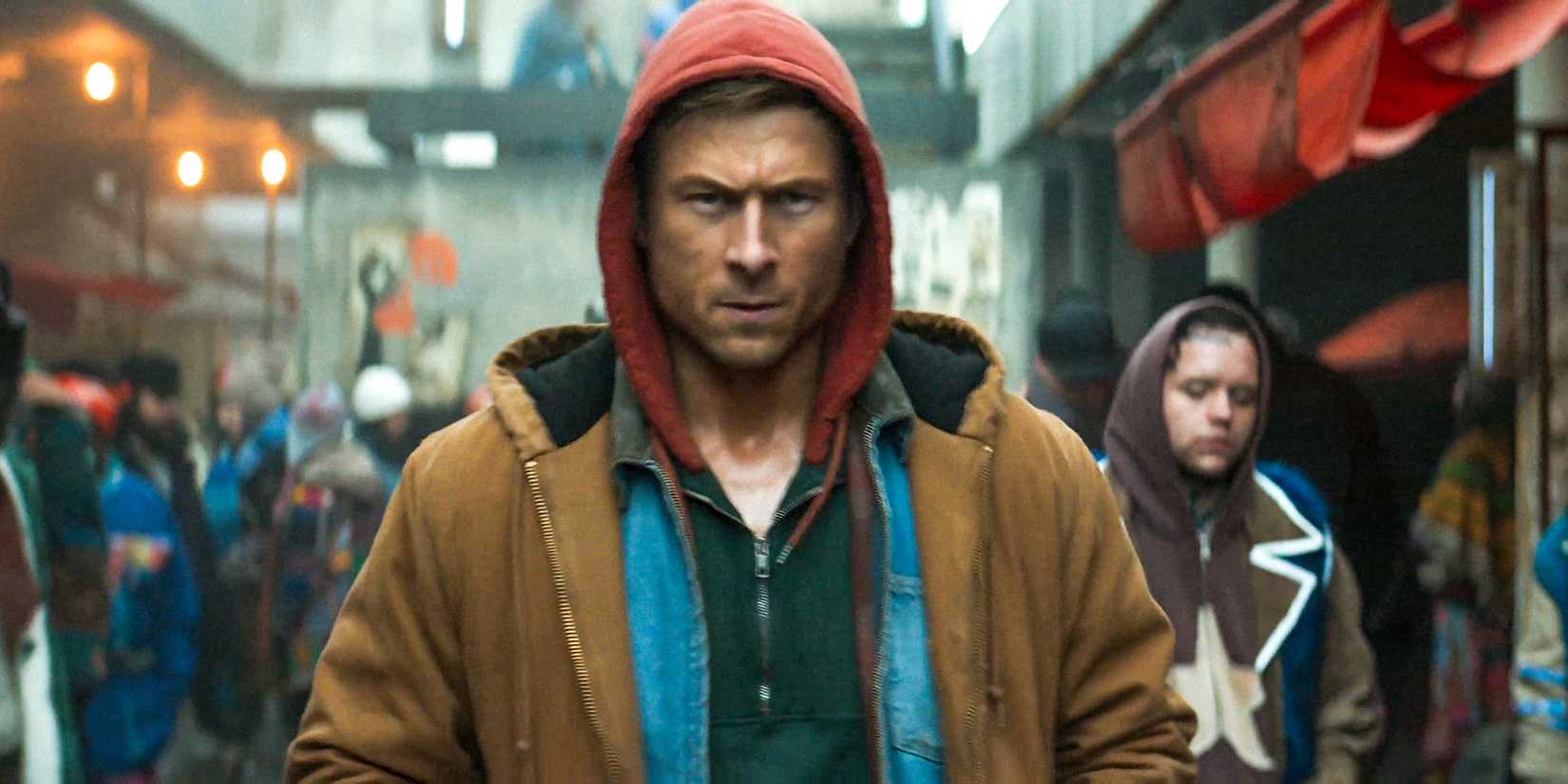 Ben Richards (Glen Powell) com um olhar determinado em The Running Man (2025)