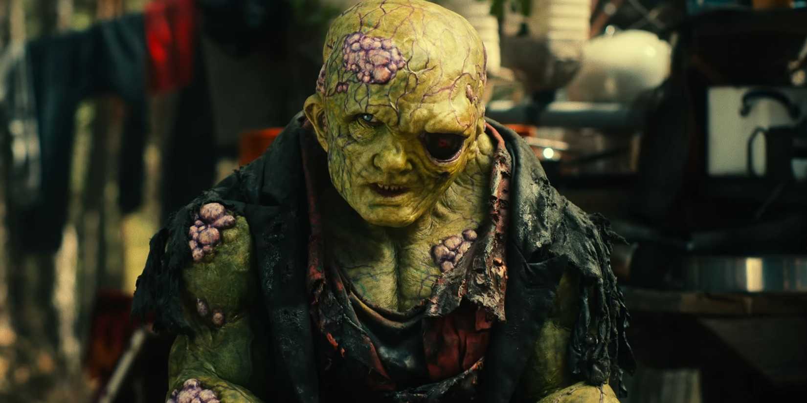 Toxie looking suspiciously while sitting in a junkyard in Toxic Avenger 2025