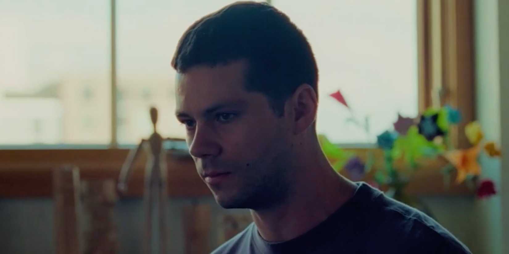 Twinless Dylan O'Brien as Roman