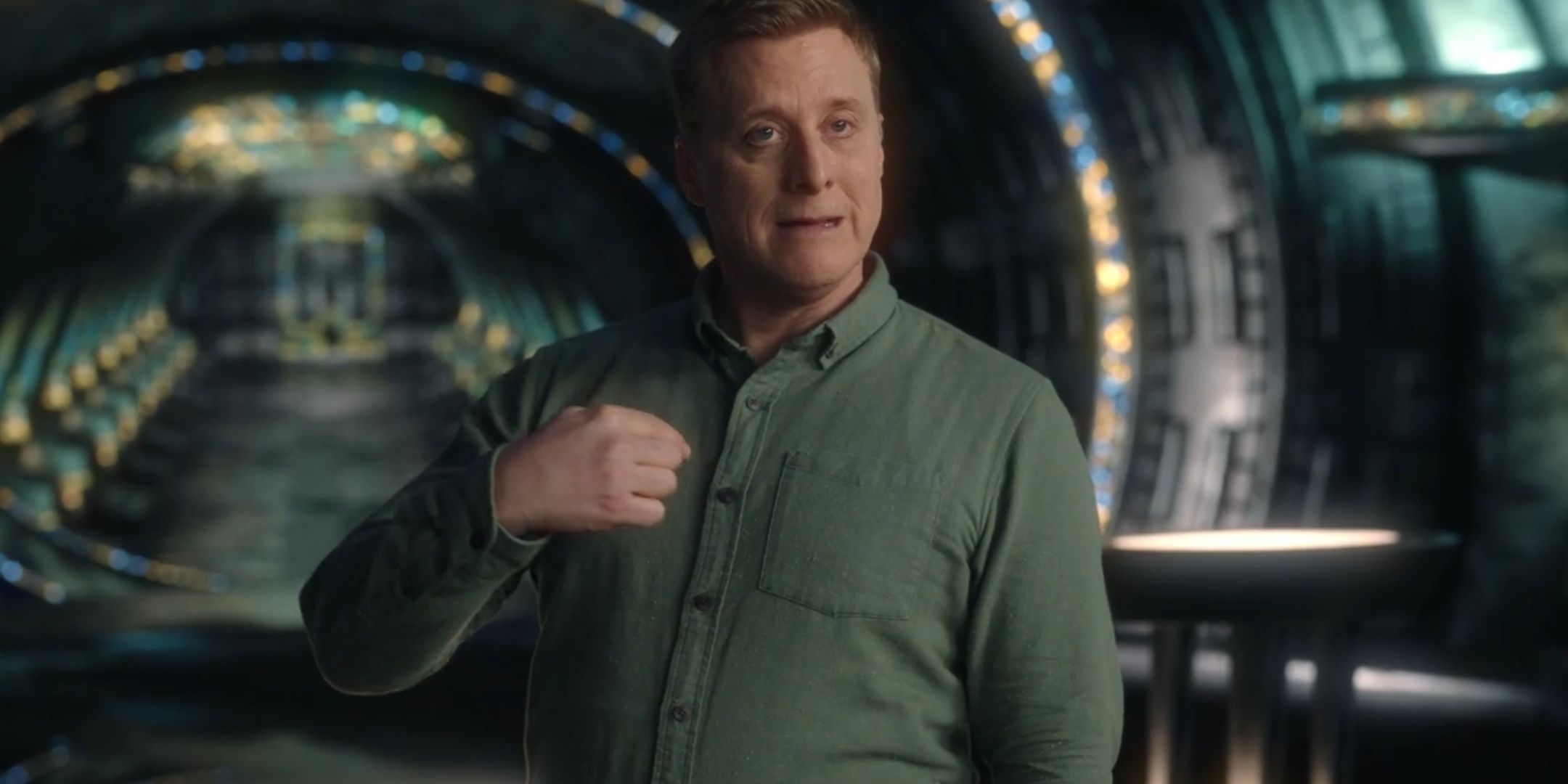 Alan Tudyk pointing to himself as Harry in Resident Alien