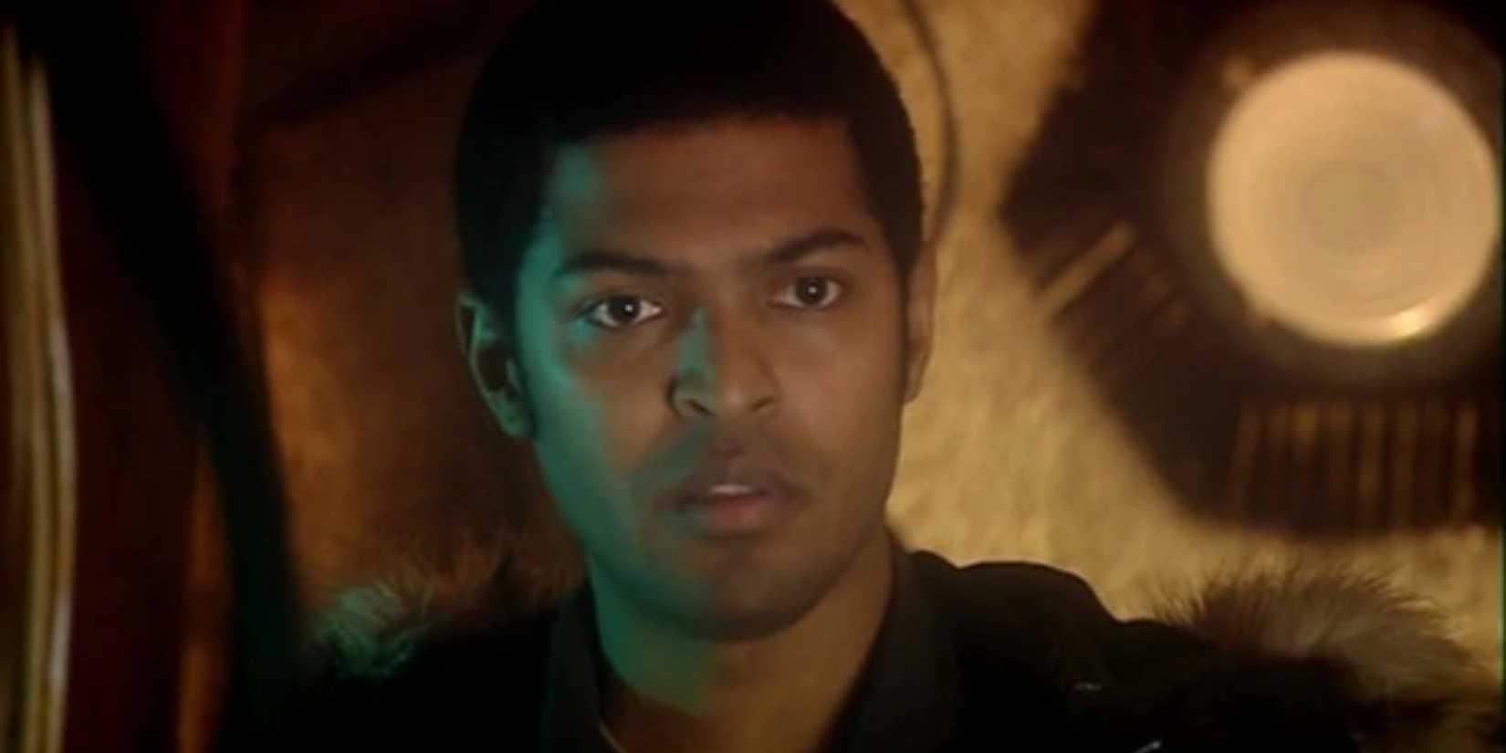 Mickey Smith in the TARDIS, looking confused as he listens to the Doctor talk, in Doctor Who episode "Boom Town."