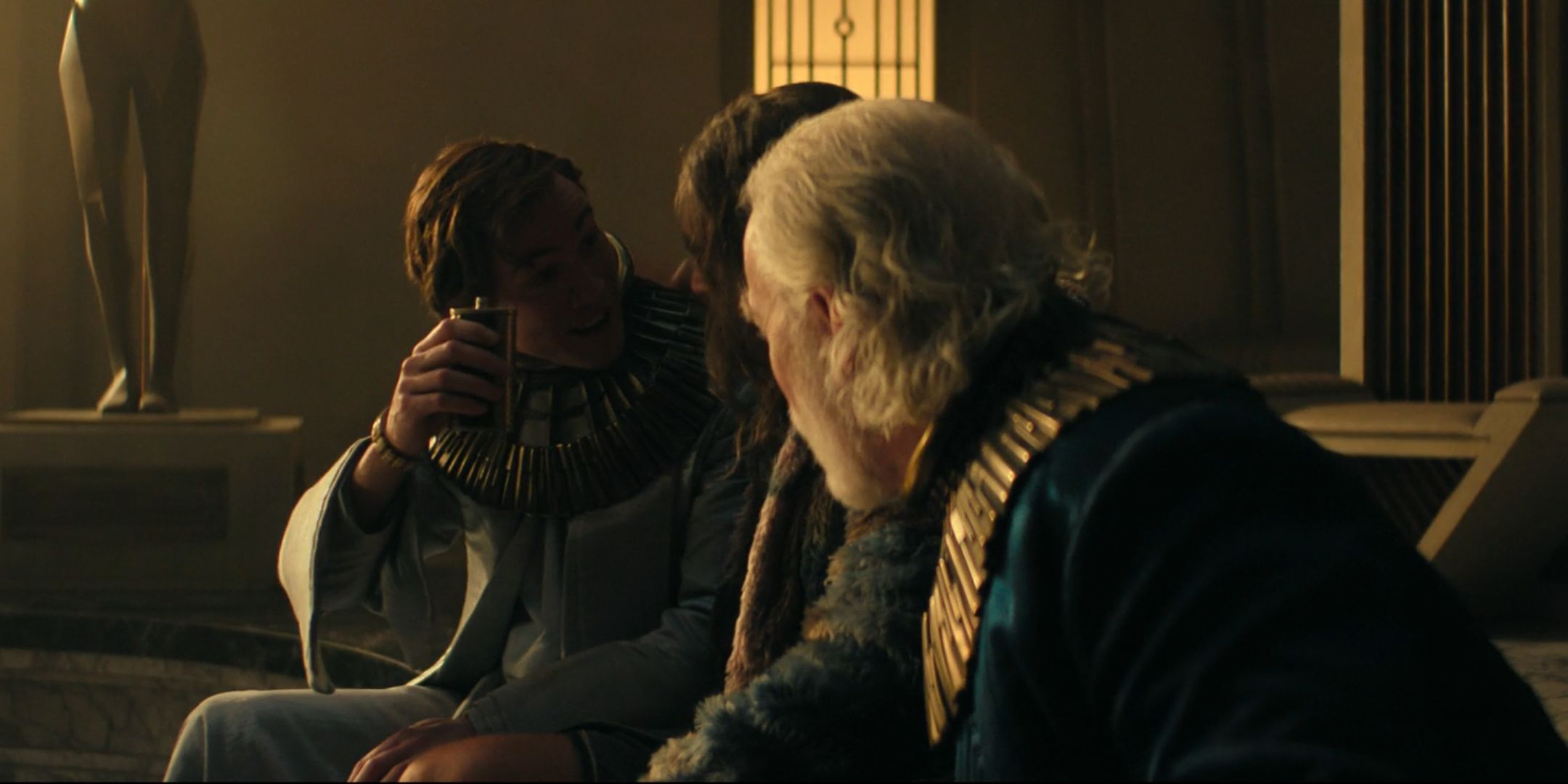 The Cleons sharing a drink in Foundation