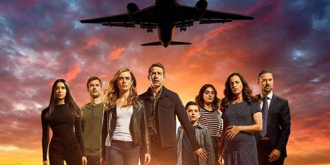The main cast of Manifest in front of a plane in the air
