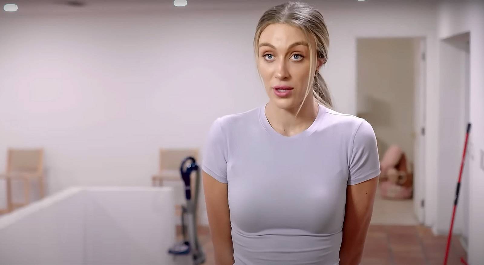 Veronica Peters from Welcome To Plathville looking irritated in a gray t-shirt.