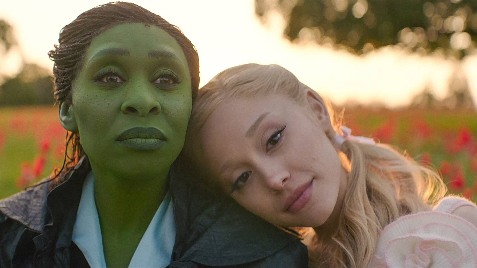 Glinda (Ariana Grande) resting her head on Elphaba’s (Cynthia Erivo) shoulder in Wicked: For Good
