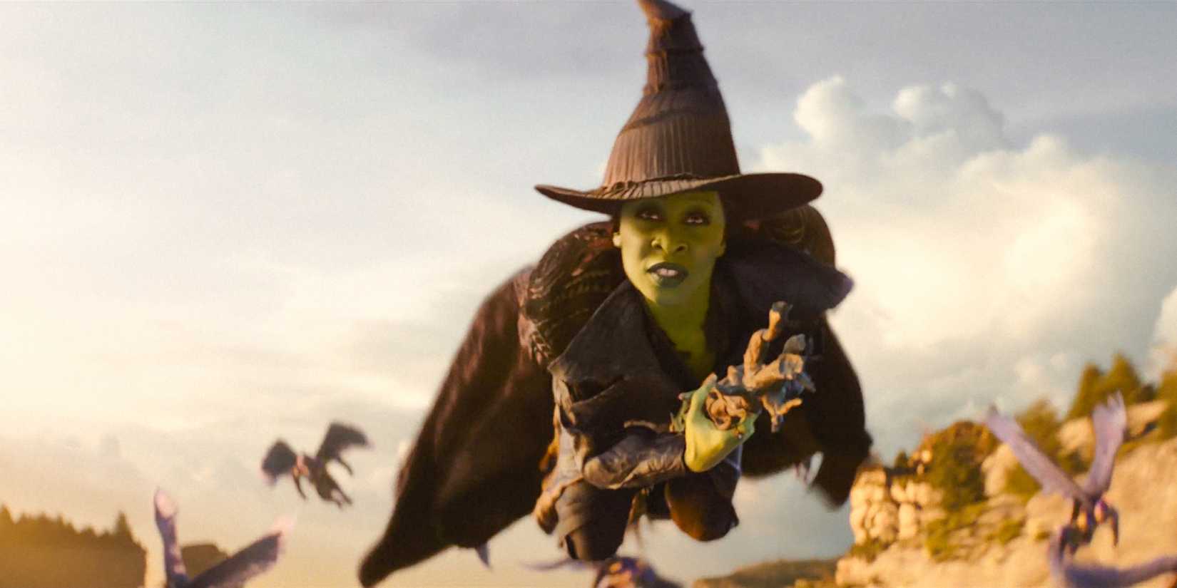 Elphaba (Cynthia Erivo) flying on her broom in Wicked: For Good