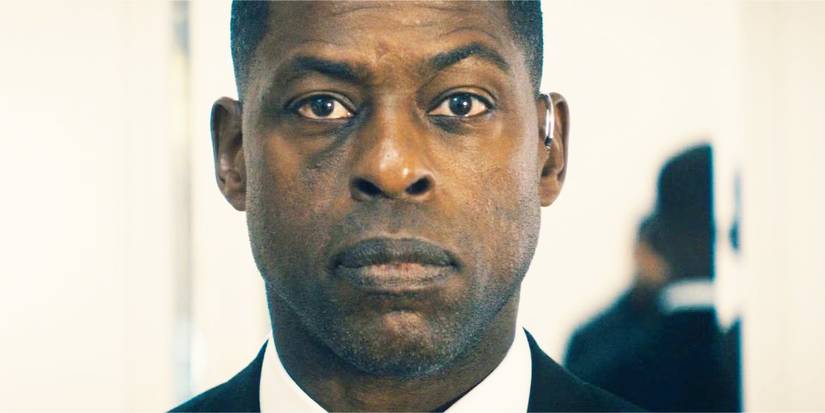 Xavier looking serious in Paradise season 1, looking at Sinatra