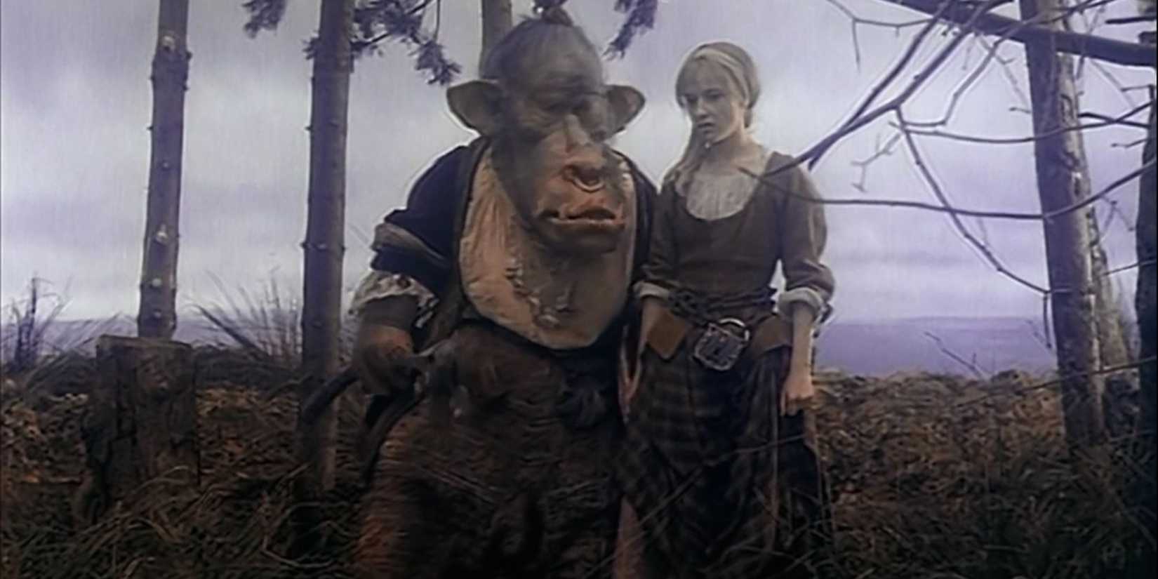 A troll walking his princess through a field in The StoryTeller.