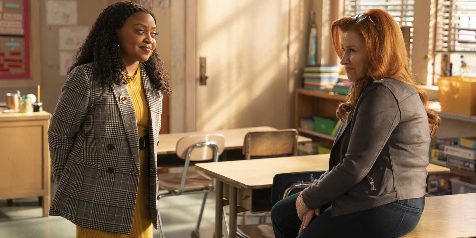Janine (Quinta Brunson) and Melissa (Lisa Ann Walter) talking in an empty classroom in Abbott Elementary