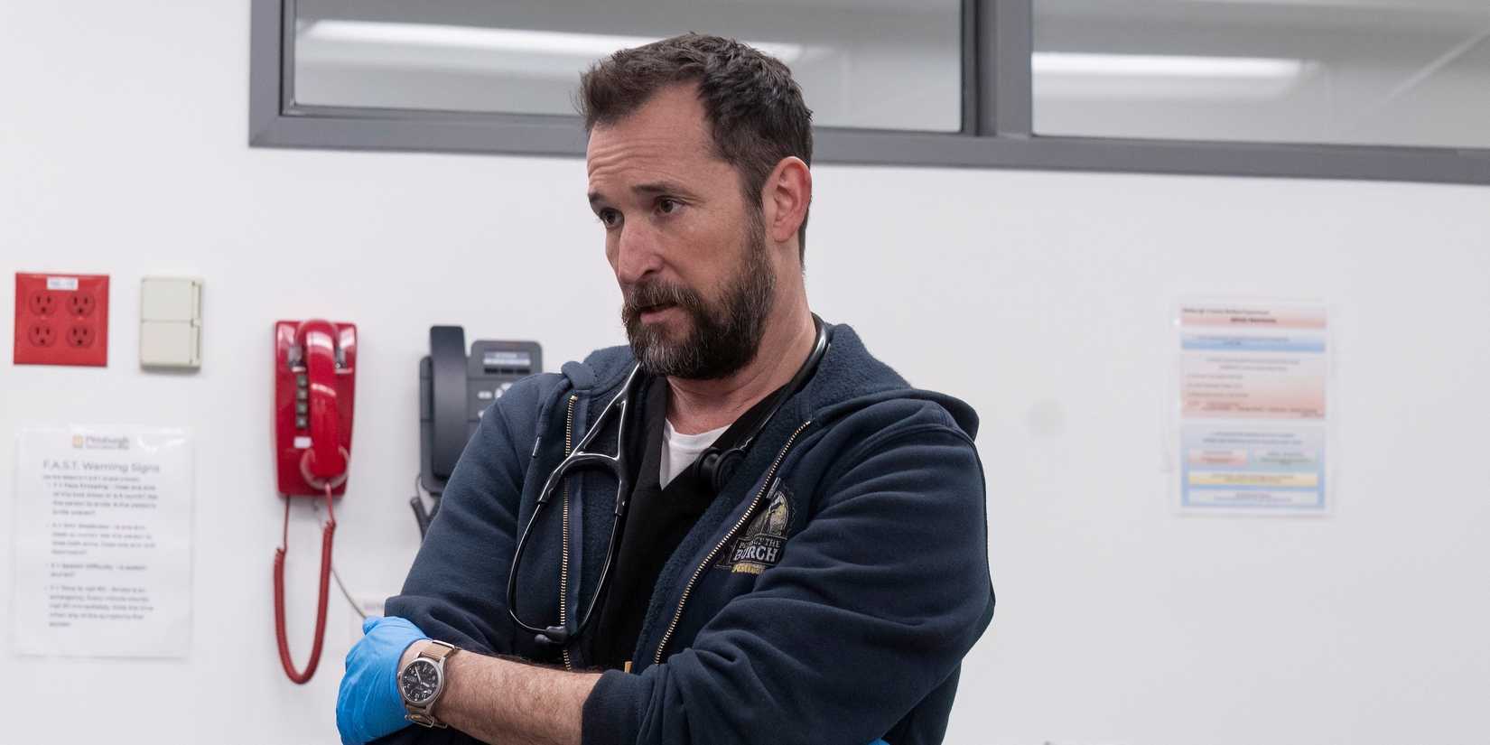 Dr. Robby (Noah Wyle) with his arms crossed in The Pitt season 1