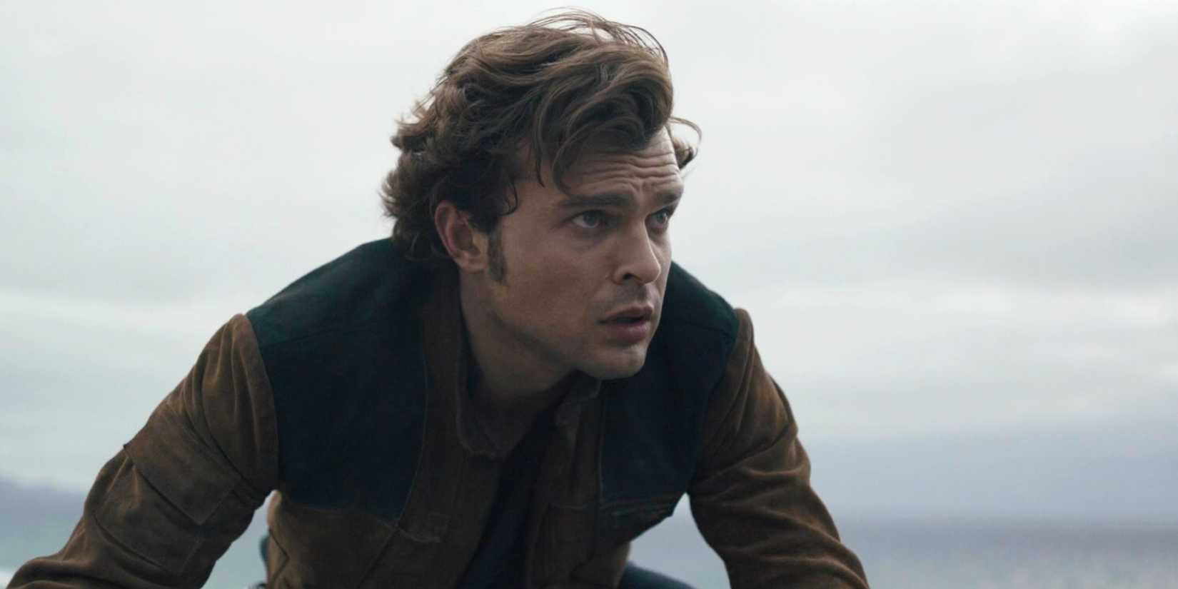 Alden Ehrenreich looking worriedly into the distance in Solo A Star Wars Story