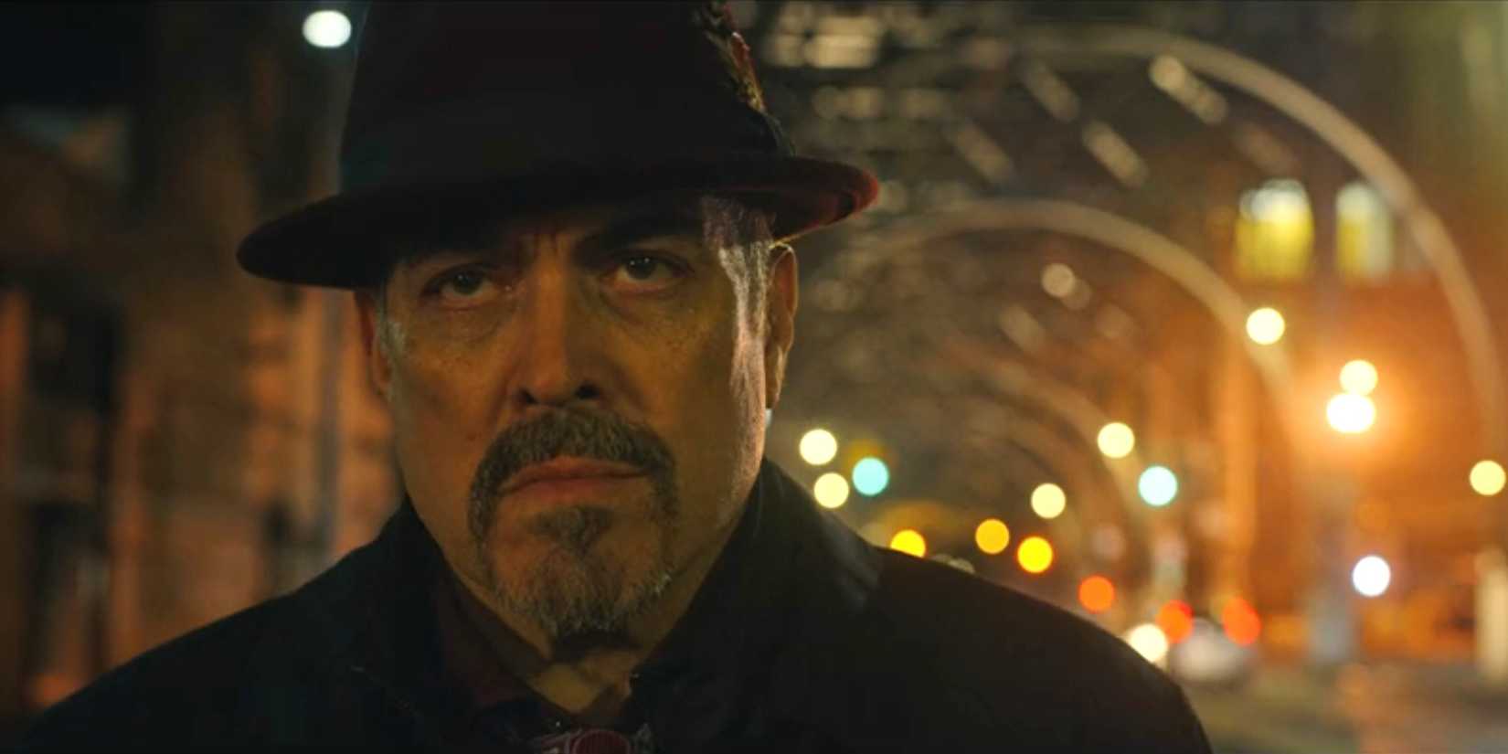 angel batista in the street looking serious in dexter ressurection episode 7