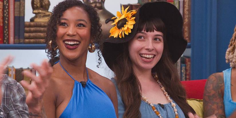 Ashley and Ava from Big Brother 27 sit together on a couch in the house