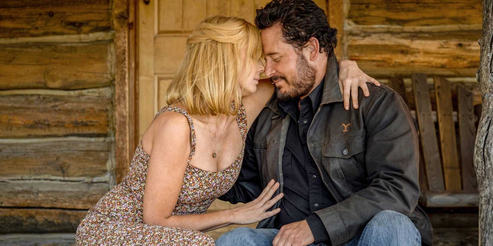 Beth and Rip leaning against each other in Yellowstone