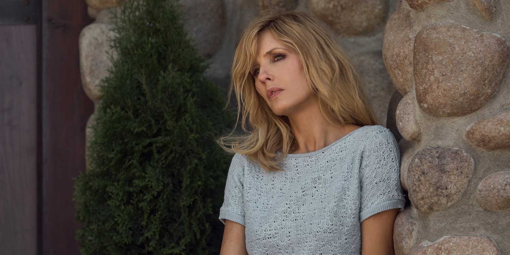 Beth looking sad in an episode and thoughtful in an episode of Yellowstone