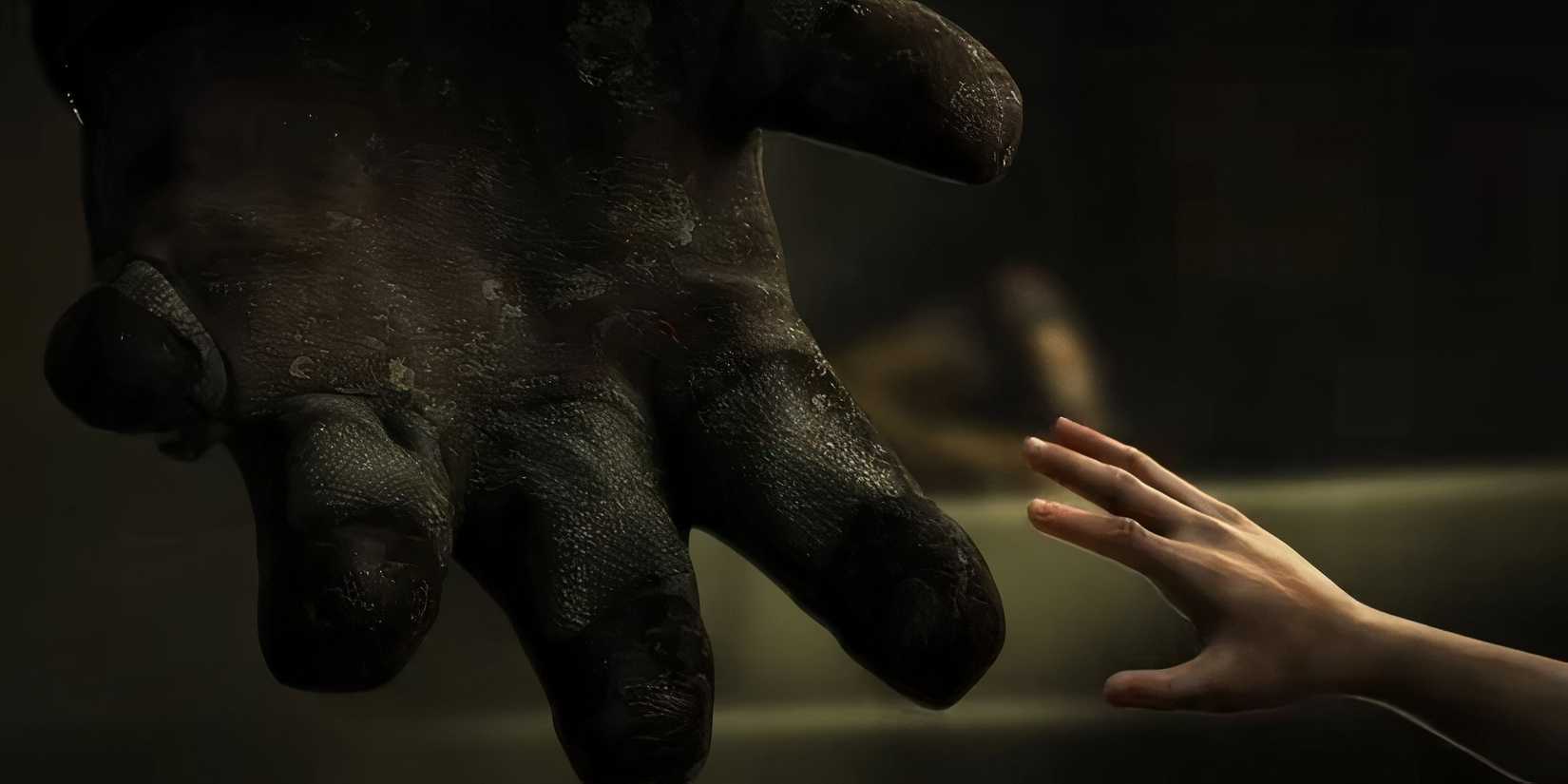 Bioshock trailer screen with Big Daddy and Little Sister hands