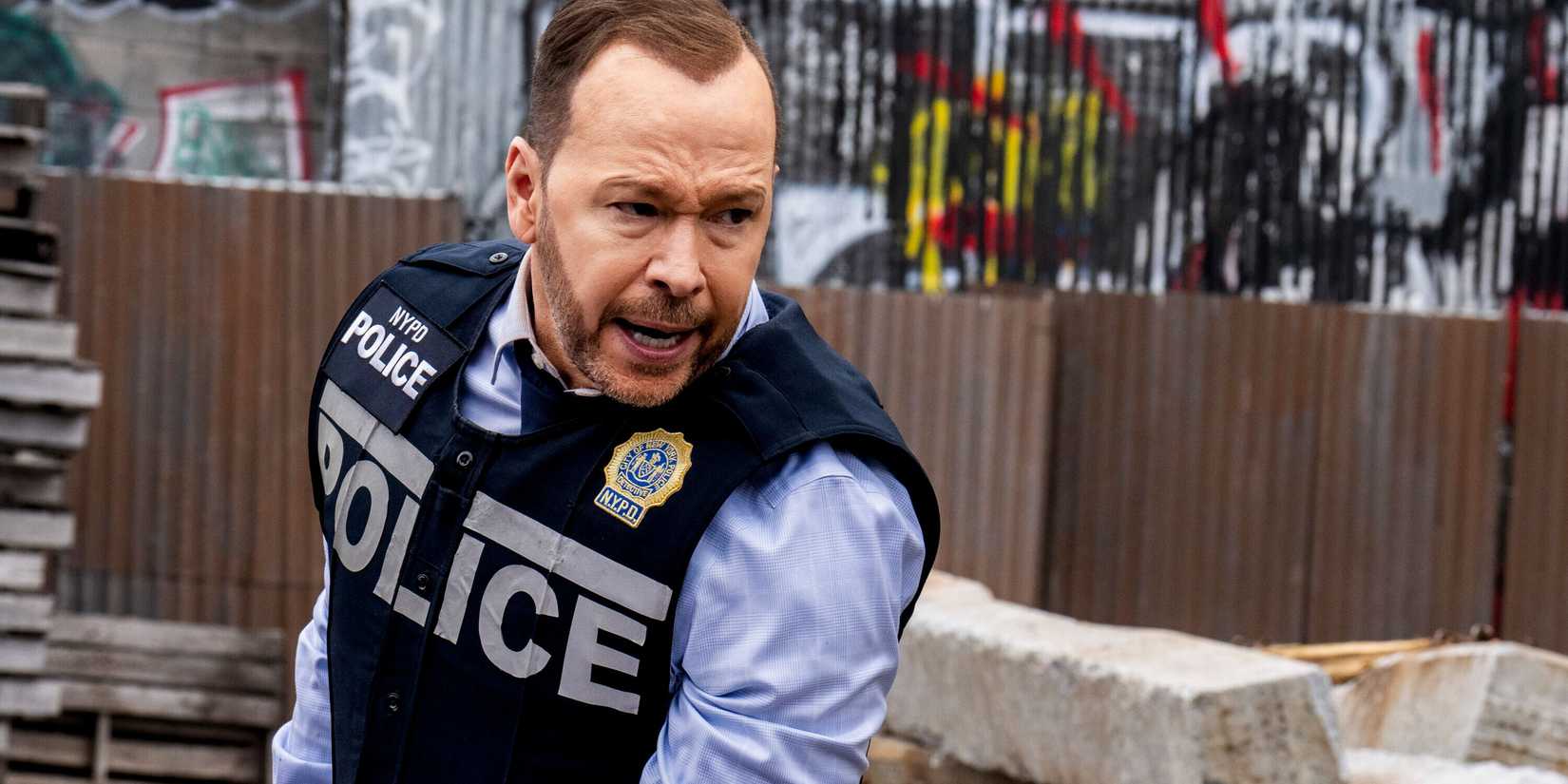 Donnie Wahlberg as Danny Reagan looking angry in a police suit in Blue Bloods