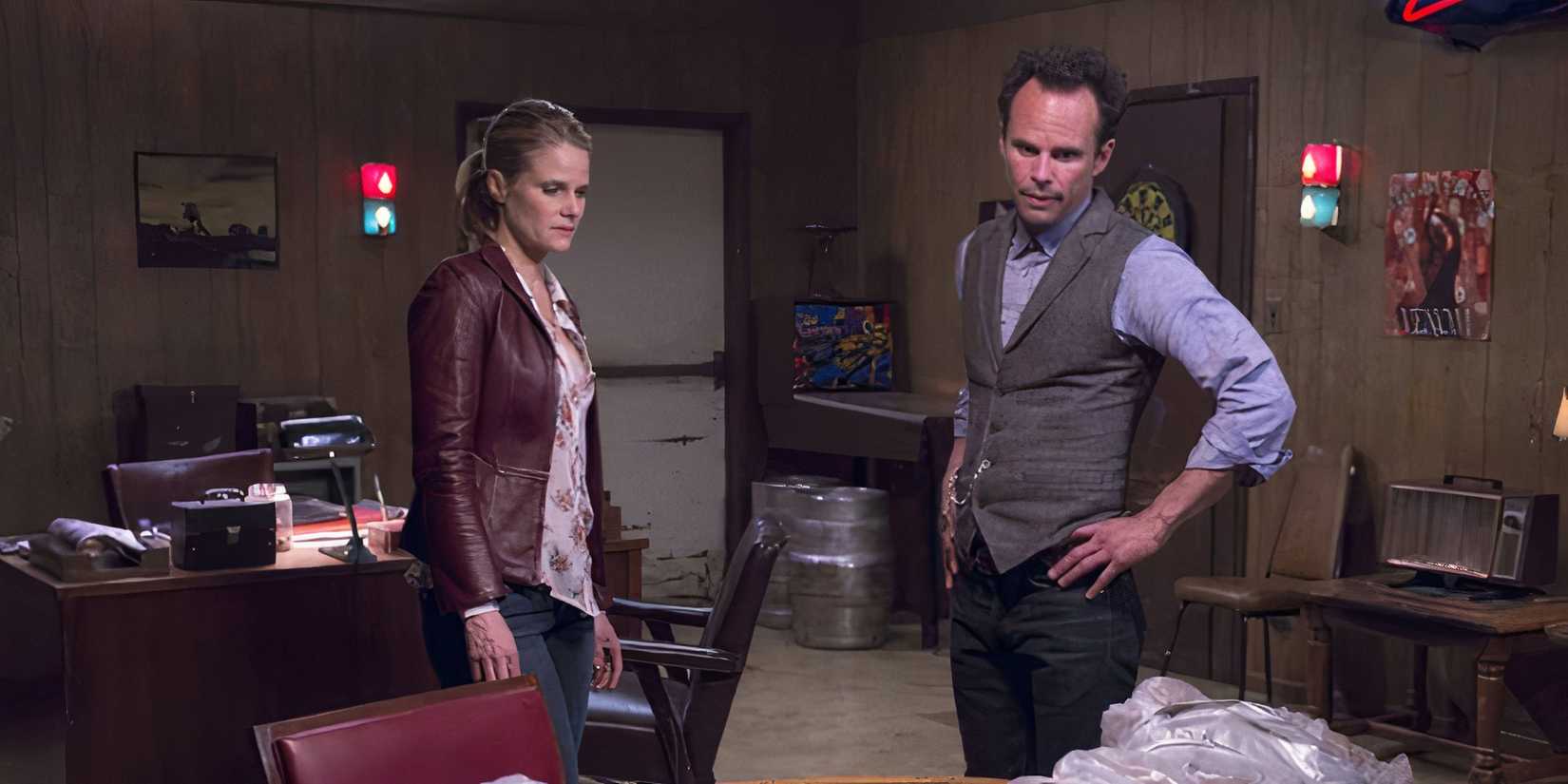 Boyd and Ava inspecting a body in the Justified episode Ghosts