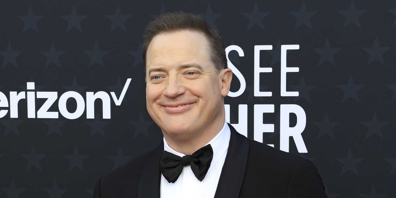 Brendan Fraser smiling on the red carpet at the Critics Choice Awards