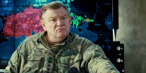Brendan Gleeson sitting in a command center in Edge of Tomorrow