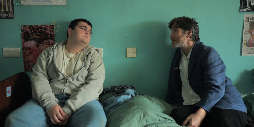 Cillian Murphy talking to a student in his dorm in Steve