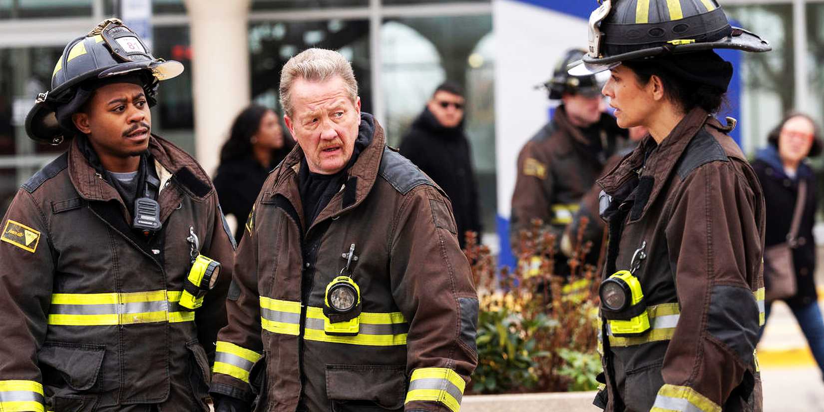 Darren Ritter, Mouch, and Stella Kidd wearing their firefighter uniforms in Chicago Fire season 13